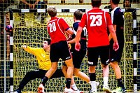 Bild: M&auml;nner mit ersten Heimsieg