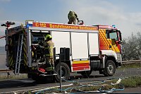 Bild: Ein Strohfeuer auf der Landstra&szlig;e