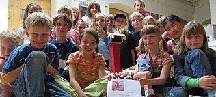Bild: Mit �ner Kiste zum Preis