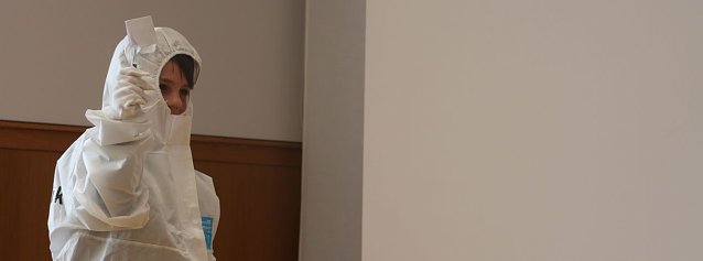 Bild: Spurensicherung in der Stadtbibliothek