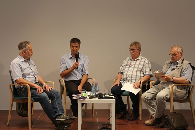 Bild: v.l.: Dietrich Hanusch, Kai Buchmann, Winfried Schmitt, Herbert Miller