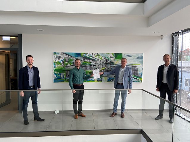 Bild: v.l.: Hr. Rollel, Hr. H&ouml;flich (beide Techem), Hr. Loup, Hr. D&ouml;rmann (beide WBG Vorstand)