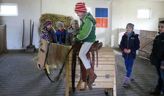 Bild: Reiten auf Herrn Bergmann