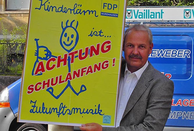 Marx mit Plakat (Foto: FDP)