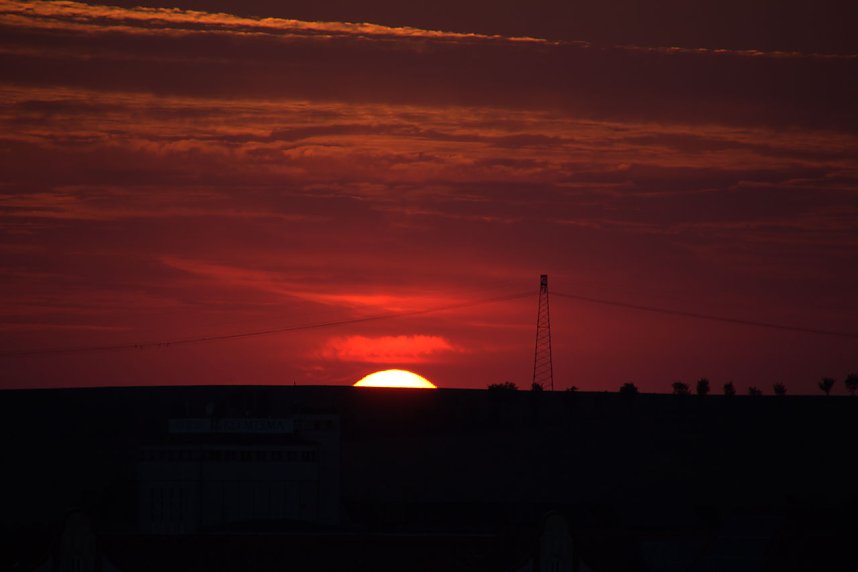 Stadt- und Sonnenansichten