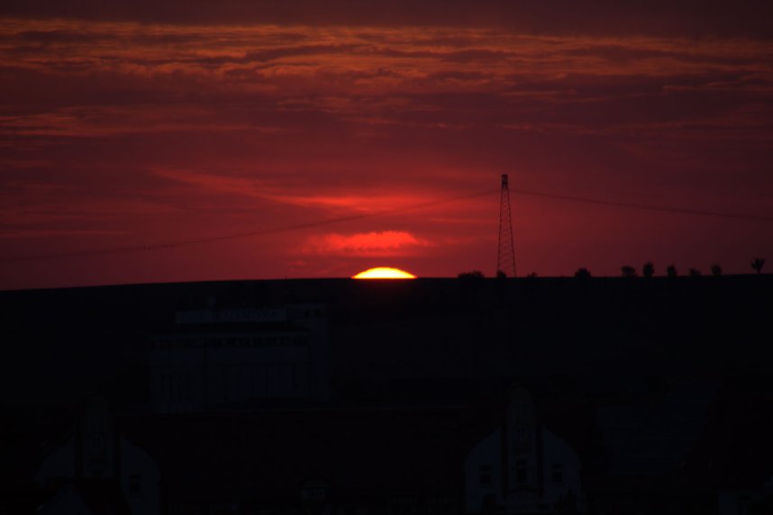 Stadt- und Sonnenansichten