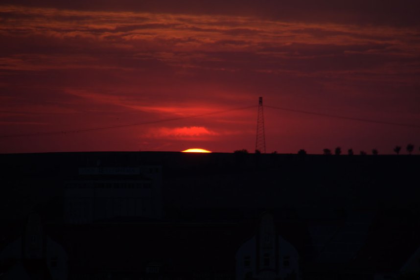 Stadt- und Sonnenansichten
