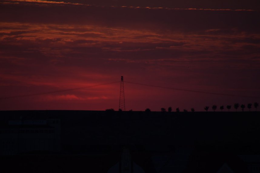Stadt- und Sonnenansichten