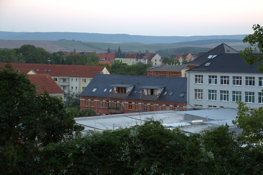 Stadt- und Sonnenansichten