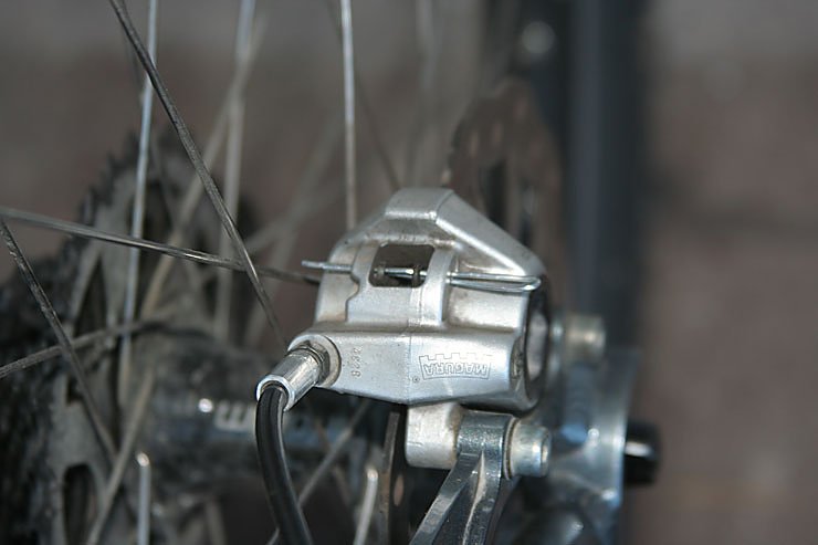 Notd&uuml;rftig geflickte Scheibenbremse an Mikes Fahrrad.